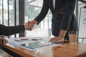 Shaking hands of businessman and Certified Public Accountant image